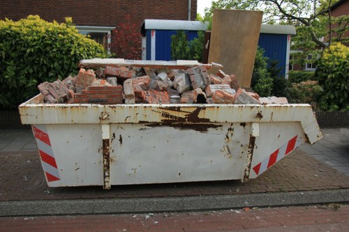 Construction site generating builders waste in South West London