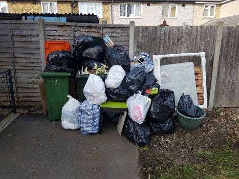 South West London waste collection trucks in action